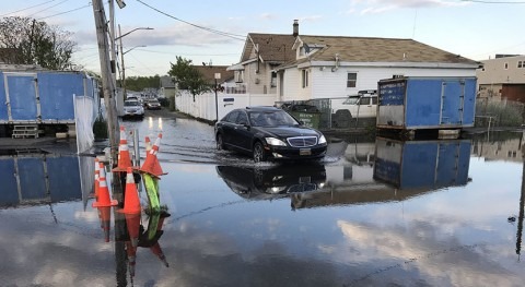Historical dredging and wetland loss in New York City's Jamaica Bay increase flooding