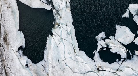 Even far below freezing, ice's surface begins melting as temperatures rise
