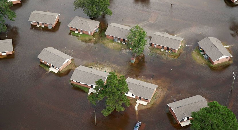 As climate risks rise, U.S. urged to update flood maps and building rules
